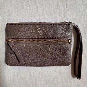 Kate Spade New York pebbled leather wristlet. Taupe color